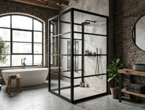 Industrial loft bathroom with exposed brick walls, black metal shower enclosure, and polished concrete floors.