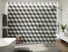 Modern bathroom with geometric pattern statement tiles in charcoal gray and white hexagons interlocking on the floor.