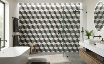 Modern bathroom with geometric pattern statement tiles in charcoal gray and white hexagons interlocking on the floor.