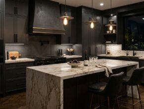 Luxurious dark kitchen with charcoal grey or navy cabinets, matte black hardware, and marble or wood accents