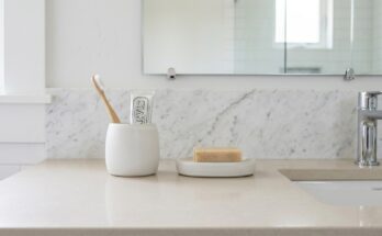 Decluttered bathroom countertop with minimal, organized essentials for a spa-like feel.