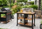Portable outdoor bar cart set up on a patio for entertaining.