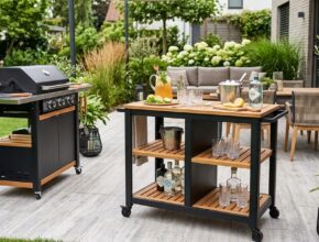 Portable outdoor bar cart set up on a patio for entertaining.